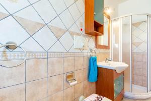 a bathroom with a toilet and a sink at Appartamento Sisto - MyHo Casa in San Salvo
