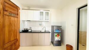 Η κουζίνα ή μικρή κουζίνα στο Era Apartment Dinh Thon