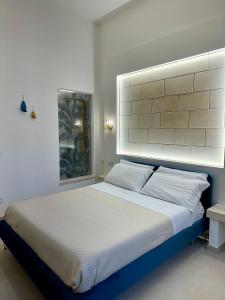 Postel nebo postele na pokoji v ubytování Terrazza Levante - Boutique rooms