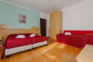 Postel nebo postele na pokoji v ubytování Hotel Spera