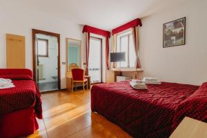 Postel nebo postele na pokoji v ubytování Hotel Spera