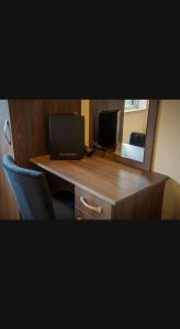 TV a/nebo společenská místnost v ubytování Clonmany Apartments
