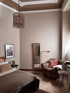 Postel nebo postele na pokoji v ubytování Guest House Mameli44
