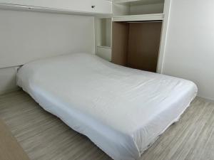 Ένα ή περισσότερα κρεβάτια σε δωμάτιο στο Grape Residence Hotel