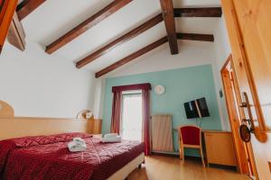 Postel nebo postele na pokoji v ubytování Hotel Spera