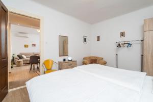 Postel nebo postele na pokoji v ubytování Apartment Family Tokic