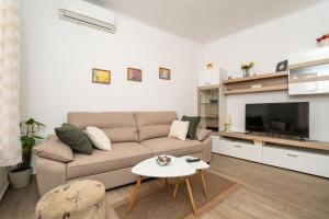 Posezení v ubytování Apartment Family Tokic