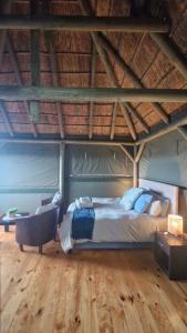 Postel nebo postele na pokoji v ubytování Harmony Luxury Tents & Safari