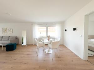 Posezení v ubytování Modernes Apartment in Bad Wörishofen + 4 fotografie