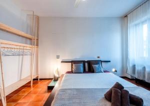 Postel nebo postele na pokoji v ubytování Salesiani rooms