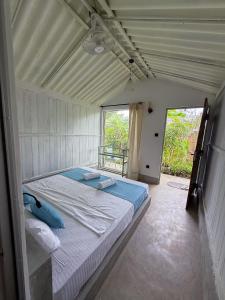 Postel nebo postele na pokoji v ubytování KA Surf Hostel