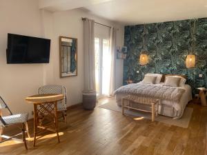 Ένα ή περισσότερα κρεβάτια σε δωμάτιο στο Castel'lodge +40 φωτογραφίες