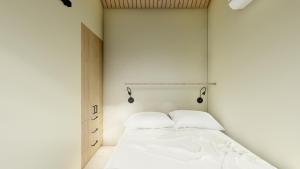 En eller flere senge i et værelse på Brouwershof