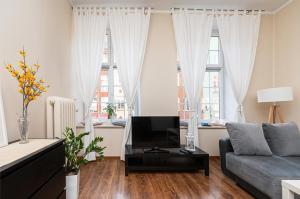 Posedenie v ubytovaní Długa Comfort Apartments