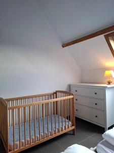 Postel nebo postele na pokoji v ubytování Tsjaka+