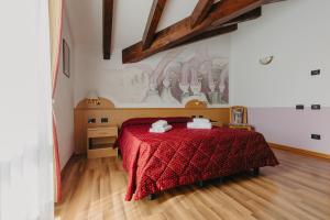 Postel nebo postele na pokoji v ubytování Hotel Spera