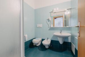 Koupelna v ubytování Hotel Spera