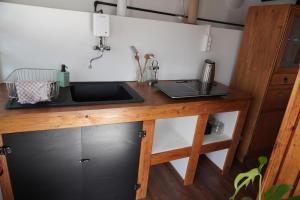 Η κουζίνα ή μικρή κουζίνα στο Casa Ländli +36 φωτογραφίες