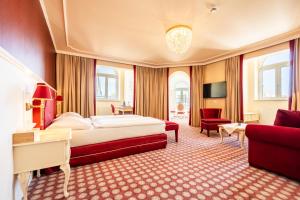Postel nebo postele na pokoji v ubytování Aviano Boutique Hotel