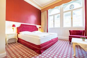 Postel nebo postele na pokoji v ubytování Aviano Boutique Hotel