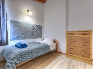 Łóżko lub łóżka w pokoju w obiekcie Holiday Home Rotonda by Interhome