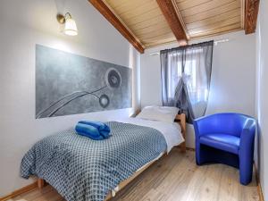Łóżko lub łóżka w pokoju w obiekcie Holiday Home Rotonda by Interhome