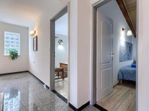 Łóżko lub łóżka w pokoju w obiekcie Holiday Home Rotonda by Interhome
