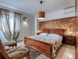 Łóżko lub łóżka w pokoju w obiekcie Holiday Home Rotonda by Interhome