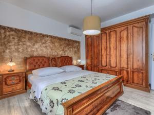 Łóżko lub łóżka w pokoju w obiekcie Holiday Home Rotonda by Interhome