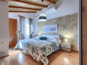 Łóżko lub łóżka w pokoju w obiekcie Holiday Home Rotonda by Interhome