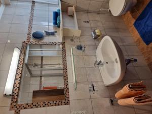 a bathroom with a shower and a toilet and a sink at Holiday Home Vesul by Interhome in Kappl +48 photos
