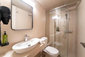 a bathroom with a sink and a shower at Diana Hotel in Zakynthos +51 photos
