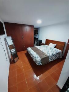 Postel nebo postele na pokoji v ubytování Bee house - Abeja viajera suite