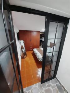 Postel nebo postele na pokoji v ubytování Bee house - Abeja viajera suite