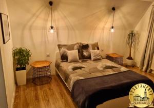 Postel nebo postele na pokoji v ubytování Apartament w Rynku