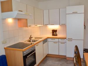 Kuchyň nebo kuchyňský kout v ubytování Apartment Kassler-3 by Interhome