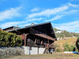 a house with a balcony on the side of it at Chalet Chalet Anthamatten-3 by Interhome in Champéry