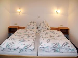 Postel nebo postele na pokoji v ubytování Holiday Home Prieslern-3 by Interhome