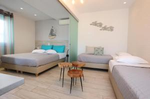 Giường trong phòng chung tại Casa di Angela