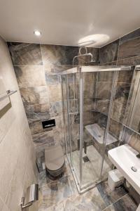Koupelna v ubytování Studio Cristal-3 by Interhome