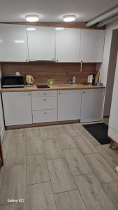 Kuchyň nebo kuchyňský kout v ubytování POKÓJ POMORSKA