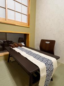 Lázně a/nebo wellness v ubytování 心斎橋梅田近く最大7名ok 75平米貸切一軒家地下鉄から3分大阪城まで徒歩空港送迎 + 21 fotografií