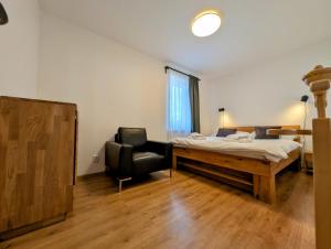 Posteľ alebo postele v izbe v ubytovaní Rodinné apartmány Dobrné