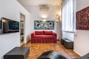 TV a/nebo společenská místnost v ubytování Belli36rooms near Spanish step and Vatican City