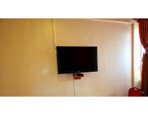 TV a/nebo společenská místnost v ubytování Pearl Palace Hotel + 21 fotografií