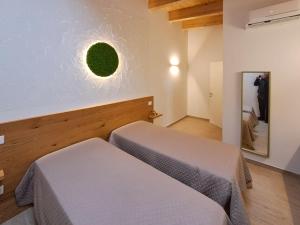 Katil atau katil-katil dalam bilik di Apartment Roseto Apartments Trilo 1 by Interhome
