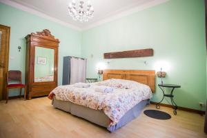 Postel nebo postele na pokoji v ubytování Le Grand Cru de Sophie