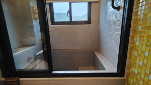 Vannituba majutusasutuses 木Box田妍山色