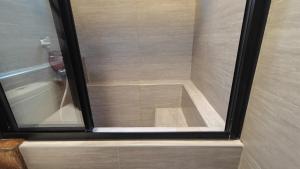 Vannituba majutusasutuses 木Box田妍山色