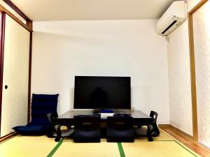Televiisor ja/või meelelahutuskeskus majutusasutuses Summit Villa 中崎町駅3分鐘 梅田商圈大阪駅 3階日式傳統町屋 100平超大空間